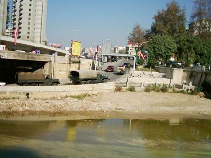 Army trucks Arrive to the demonstration scene 11-21-03